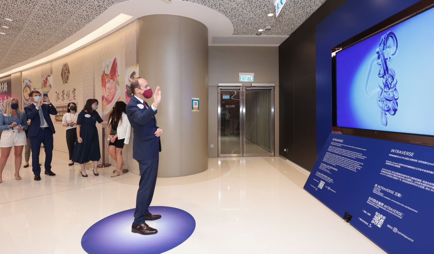 Guests try their hand on interacting with the fascinating digital art installation Intraverse.
